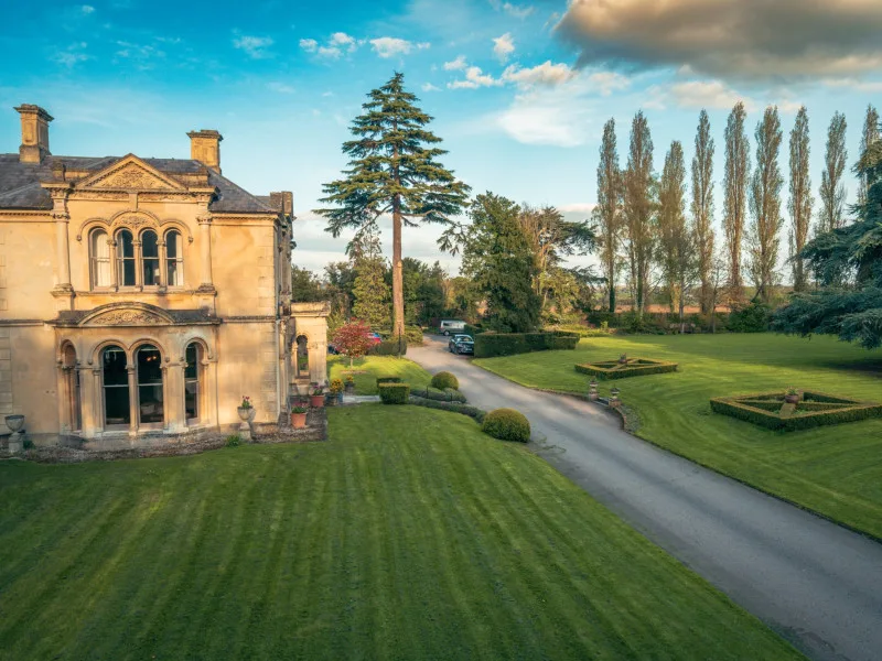 Bedroom with balcony and pool view
